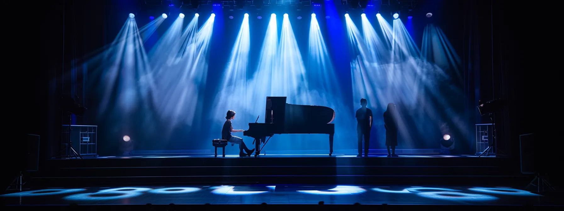 young pianists performing on stage, showcasing their remarkable proficiency and musical expression, with proud parents watching from the audience.