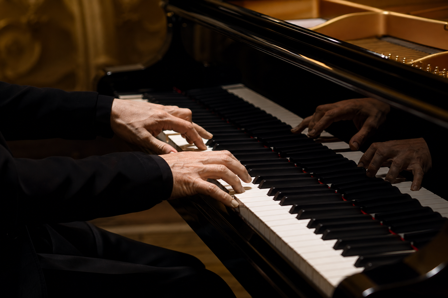 Pianist hands at a concert grand evoking Marc Andre Hamelin virtuosity and rare repertoire